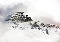 Snow covered mountains with fog in Telluride.. Original public domain image from Wikimedia Commons