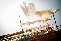 Laundry hanging from balcony. Original public domain image from Wikimedia Commons