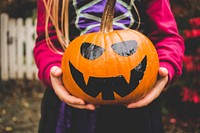 Halloween pumpkin, festive decoration. Original public domain image from Wikimedia Commons