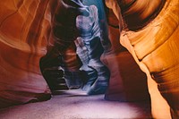 Sunlight shines inside Antelope Canyons casting shadows on the curved walls. Original public domain image from <a href="https://commons.wikimedia.org/wiki/File:Antelope_Canyon_(Unsplash).jpg" target="_blank" rel="noopener noreferrer nofollow">Wikimedia Commons</a>