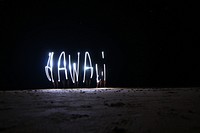 A night-time light painting that spells out HAWAII, taken on Anini Beach. Original public domain image from Wikimedia Commons