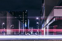 A long-exposure shot of light trails in a street in Copenhagen at night. Original public domain image from Wikimedia Commons