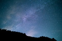 Starry night sky. Original public domain image from <a href="https://commons.wikimedia.org/wiki/File:Sora_Sagano_2016_(Unsplash).jpg" target="_blank">Wikimedia Commons</a>