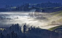 Mist over green undulating hills in Hirzel. Original public domain image from Wikimedia Commons