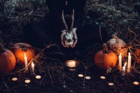 Woman holding skull in Halloween. Original public domain image from Wikimedia Commons