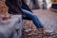 Low shot of woman wearing jeans and a fall coat. Original public domain image from <a href="https://commons.wikimedia.org/wiki/File:Fall_Fashion_(Unsplash).jpg" target="_blank" rel="noopener noreferrer nofollow">Wikimedia Commons</a>