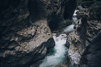 Stream water from waterfall through the rock in Silberkarklamm, Austria. Original public domain image from <a href="https://commons.wikimedia.org/wiki/File:Silberkarklamm,_Austria_(Unsplash).jpg" target="_blank">Wikimedia Commons</a>