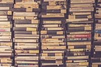 Pile of old & vintage books in a library. Original public domain image from Wikimedia Commons