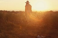 Woman standing on a grassy field. Original public domain image from <a href="https://commons.wikimedia.org/wiki/File:Leon_Seierlein_2015-11-17_(Unsplash).jpg" target="_blank">Wikimedia Commons</a>