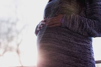 A pregnant woman. Original public domain image from <a href="https://commons.wikimedia.org/wiki/File:Olsztyn,_Poland_(Unsplash_xTedodxYTuQ).jpg" target="_blank">Wikimedia Commons</a>