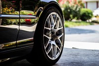 A side shot of a tire and part of the vehicle. Original public domain image from Wikimedia Commons