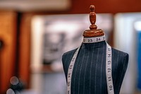 A mannequin with measuring tape wrapped around its neck. Original public domain image from Wikimedia Commons