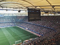 Football stadium and packed crowd. Original public domain image from Wikimedia Commons