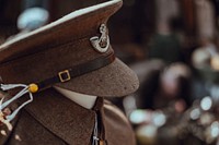 Ranking officer's hat on a mannequin with a uniform. Original public domain image from Wikimedia Commons