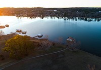 Aerial view shot with a drone of boathouses in Guntersville, Alabama during sunset. Original public domain image from Wikimedia Commons