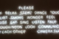 Positive bright white neon white sign on dark background, Museum of Fine Arts, Boston. Original public domain image from Wikimedia Commons