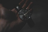Hand holding a watch. Original public domain image from <a href="https://commons.wikimedia.org/wiki/File:Leon_Christopher_2017-02-26_(Unsplash).jpg" target="_blank">Wikimedia Commons</a>