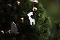 Reindeer ornament on Christmas tree. Original public domain image from Wikimedia Commons