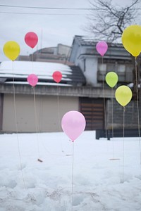 Colorful balloons are placed standing on the snow in Tokamachi.. Original public domain image from <a href="https://commons.wikimedia.org/wiki/File:Colors_Balloons_Snow_Tokamachi_(Unsplash).jpg" target="_blank" rel="noopener noreferrer nofollow">Wikimedia Commons</a>