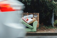 An old armchair and a teddy bear left behind on a roadside. Original public domain image from Wikimedia Commons