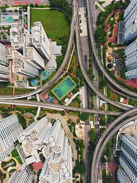 A drone shot of crossing roads in an urban neighborhood in Singapore. Original public domain image from Wikimedia Commons