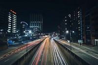 Car light trails in city at night. Original public domain image from Wikimedia Commons