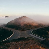 Empty roads circle around a mountain. Original public domain image from Wikimedia Commons