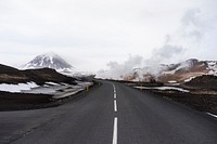 An asphalt road in the mountains with steam rising up on the roadside. Original public domain image from <a href="https://commons.wikimedia.org/wiki/File:Steam_on_the_roadside_(Unsplash).jpg" target="_blank" rel="noopener noreferrer nofollow">Wikimedia Commons</a>