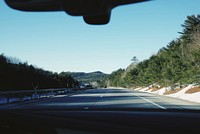 Grey road on car front view. Original public domain image from <a href="https://commons.wikimedia.org/wiki/File:Catskill,_United_States_(Unsplash).jpg" target="_blank">Wikimedia Commons</a>