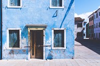 Weathered home exterior on Burano Island, Venice, Italy. Original public domain image from Wikimedia Commons