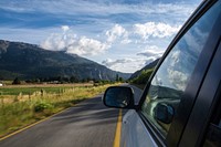 Car on empty asphalt road. Original public domain image from Wikimedia Commons