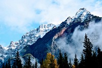 Imposing snow-topped mountain peaks in Jasper National Park. Original public domain image from Wikimedia Commons