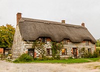 Cozy country cottage with thatched roof in England. Original public domain image from <a href="https://commons.wikimedia.org/wiki/File:Cozy_Cottage_Home_(Unsplash).jpg" target="_blank" rel="noopener noreferrer nofollow">Wikimedia Commons</a>