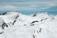 Mountain ridges with snow-covered slopes in Les Orres. Original public domain image from <a href="https://commons.wikimedia.org/wiki/File:Mountains_in_Les_Orres_(Unsplash).jpg" target="_blank" rel="noopener noreferrer nofollow">Wikimedia Commons</a>