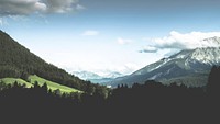 A long mountain valley covered in evergreen woods in Hintersee. Original public domain image from <a href="https://commons.wikimedia.org/wiki/File:Forests_in_a_mountain_valley_(Unsplash).jpg" target="_blank" rel="noopener noreferrer nofollow">Wikimedia Commons</a>