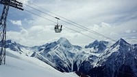 A chairlift in the mountains. Original public domain image from <a href="https://commons.wikimedia.org/wiki/File:Stella_Caraman_2015_(Unsplash).jpg" target="_blank">Wikimedia Commons</a>