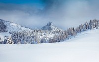 A background consisting of a foggy sky at the winter alps in Postalm. Original public domain image from Wikimedia Commons