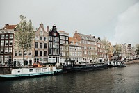 Amsterdam Canal Houses. Original public domain image from <a href="https://commons.wikimedia.org/wiki/File:Amsterdam_Canal_Houses_(Unsplash).jpg" target="_blank" rel="noopener noreferrer nofollow">Wikimedia Commons</a>
