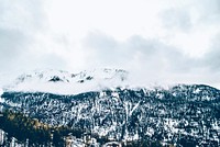 Snow covered mountains with a clear white sky in Les Orres.. Original public domain image from <a href="https://commons.wikimedia.org/wiki/File:Snow_covered_mountains_in_Les_Orres_(Unsplash).jpg" target="_blank" rel="noopener noreferrer nofollow">Wikimedia Commons</a>