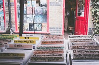 Colorful tabs on vinyl records in front of a record store. Original public domain image from <a href="https://commons.wikimedia.org/wiki/File:Vinyl_records_on_display_(Unsplash).jpg" target="_blank" rel="noopener noreferrer nofollow">Wikimedia Commons</a>