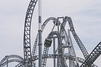 A fun and scary roller coaster with lots of twist in an amusement park in Fuji-Q Highland. Original public domain image from <a href="https://commons.wikimedia.org/wiki/File:Roller_coaster_in_a_park_(Unsplash).jpg" target="_blank" rel="noopener noreferrer nofollow">Wikimedia Commons</a>
