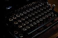 Vintage black typewriter. Original public domain image from Wikimedia Commons