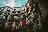 Multicolored apartment building. Original public domain image from <a href="https://commons.wikimedia.org/wiki/File:Gothic_Quarter,_Barcelona,_Spain_(Unsplash).jpg" target="_blank">Wikimedia Commons</a>