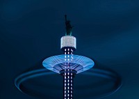 A look at lights in motion at an illuminated tower inside the Luna Park amusement park. Original public domain image from Wikimedia Commons