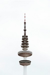 The tip of a communications tower in Hamburg against a white sky. Original public domain image from Wikimedia Commons