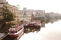 Double decker boats docked along the river in historic York. Original public domain image from Wikimedia Commons