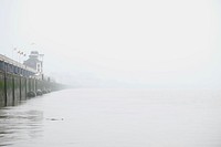 Wall by the seaside on a foggy morning in Antwerp. Original public domain image from Wikimedia Commons