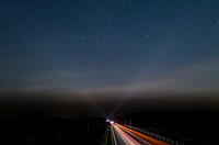 NIght time long exposure photography of a traffic. Original public domain image from <a href="https://commons.wikimedia.org/wiki/File:Drone_view_of_night-time_driving_(Unsplash).jpg" target="_blank">Wikimedia Commons</a>