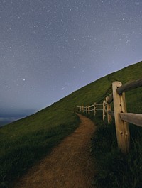 A narrow path on a hill along a log wood fence in Mount Tamalpais. Original public domain image from Wikimedia Commons