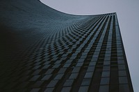 Low-angle shot of dark high rise office building. Original public domain image from <a href="https://commons.wikimedia.org/wiki/File:Studio_Bell_(Unsplash).jpg" target="_blank">Wikimedia Commons</a>